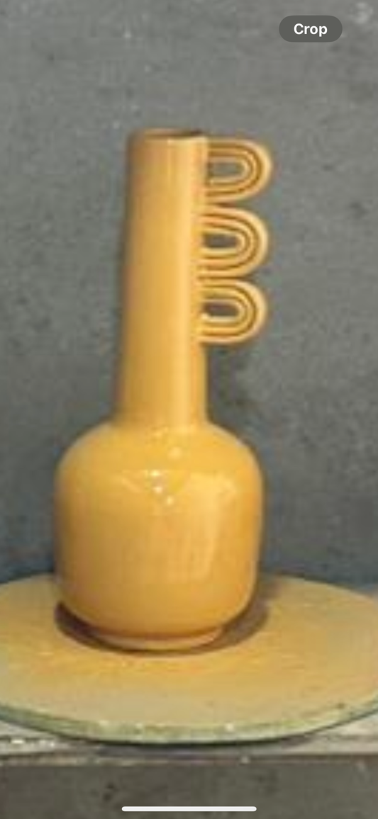 Yellow pottery vase